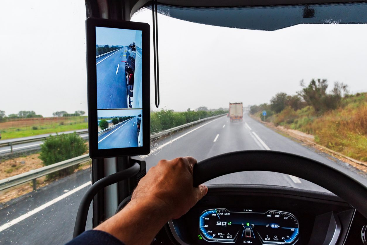 Driver's view from the cab with an S-Vision camera monitor mounted at the windscreen pillar